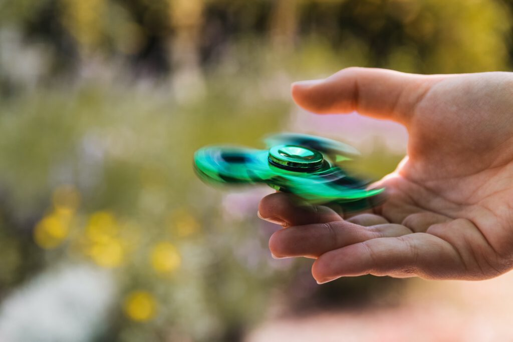 groene fidget spinner stimmen autisme